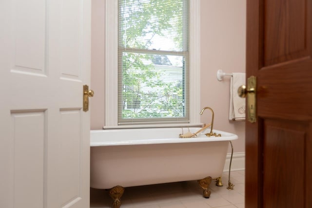 557 Wayne Ave S, Waynesboro, VA 22980 - bathroom with a freestanding tub and tile patterned flooring