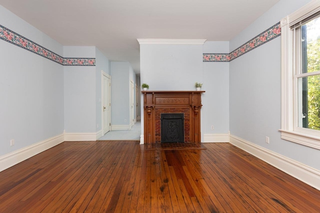 557 Wayne Ave S, Waynesboro, VA 22980 - unfurnished living room featuring hardwood / wood-style floors, a fireplace, and baseboards
