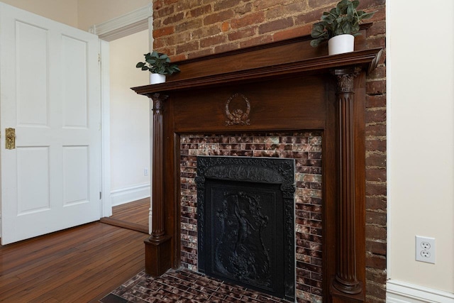 557 Wayne Ave S, Waynesboro, VA 22980 - detailed view of a brick fireplace and wood finished floors