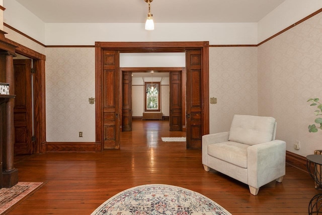 557 Wayne Ave S, Waynesboro, VA 22980 - living area with hardwood / wood-style floors, baseboards, and radiator heating unit
