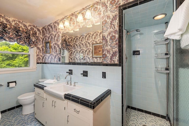 188 Middlebrook Rd, Staunton, VA 24401 - full bath featuring tile walls, wallpapered walls, vanity, a shower stall, and tile patterned floors