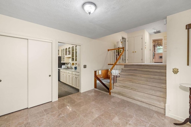 188 Middlebrook Rd, Staunton, VA 24401 - stairway with baseboards and a textured ceiling
