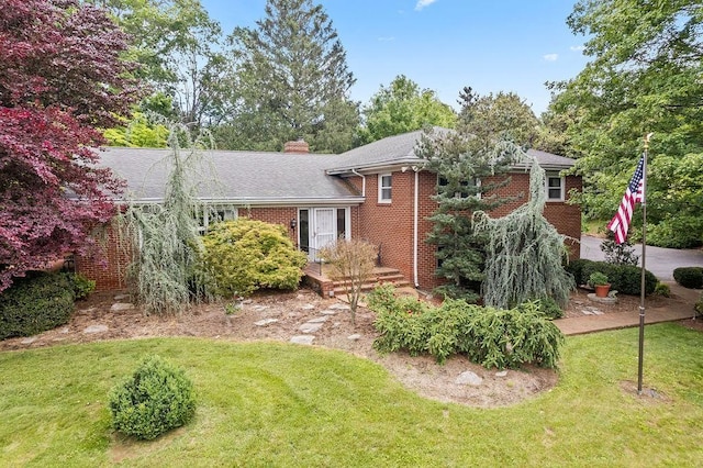 188 Middlebrook Rd, Staunton, VA 24401 - tri-level home featuring brick siding, a front lawn, and a chimney