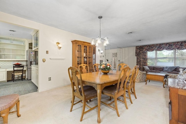 188 Middlebrook Rd, Staunton, VA 24401 - dining space with light carpet and a chandelier