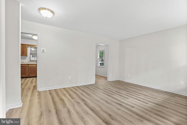 447 Laurel Ave, Fredericksburg, VA 22408 - unfurnished room with light wood-style floors and baseboards
