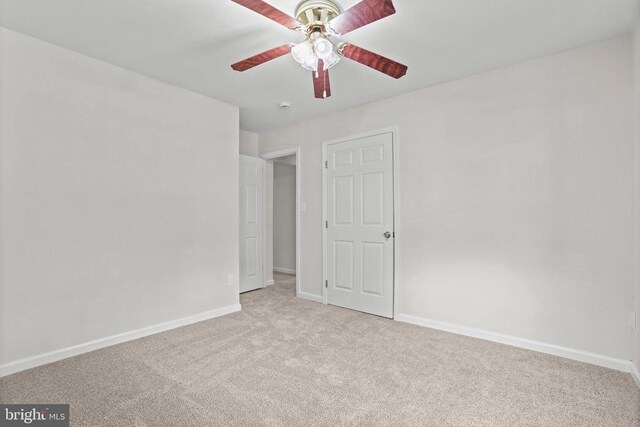 447 Laurel Ave, Fredericksburg, VA 22408 - spare room featuring light colored carpet, baseboards, and ceiling fan