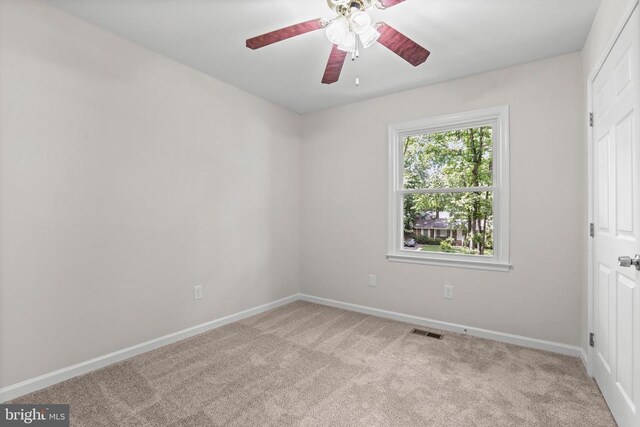 447 Laurel Ave, Fredericksburg, VA 22408 - empty room with light carpet, ceiling fan, and baseboards
