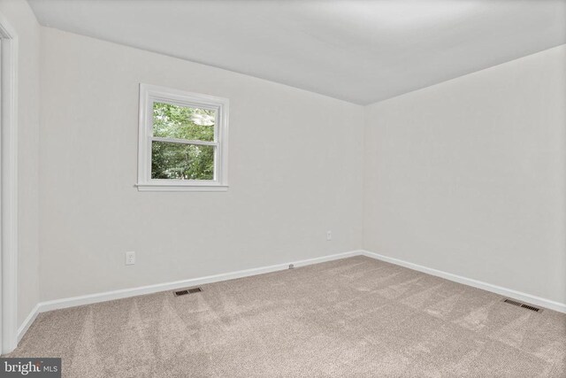 447 Laurel Ave, Fredericksburg, VA 22408 - carpeted empty room featuring baseboards