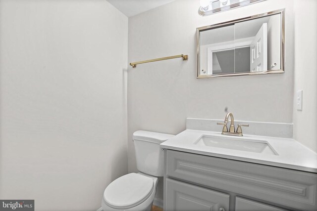 447 Laurel Ave, Fredericksburg, VA 22408 - half bathroom featuring vanity and toilet