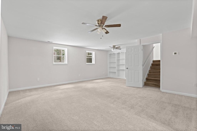 447 Laurel Ave, Fredericksburg, VA 22408 - unfurnished living room featuring light colored carpet, a ceiling fan, and baseboards