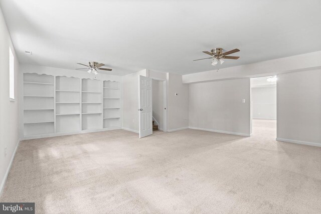 447 Laurel Ave, Fredericksburg, VA 22408 - unfurnished living room featuring a ceiling fan, carpet floors, and baseboards