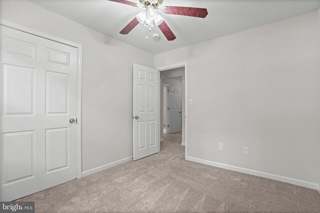 447 Laurel Ave, Fredericksburg, VA 22408 - unfurnished bedroom with carpet, baseboards, and a ceiling fan