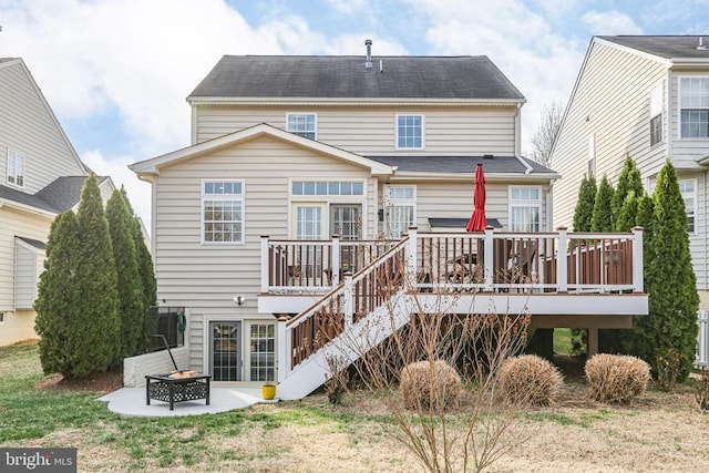 5502 Joshua Tree Cir, Fredericksburg, VA 22407 - rear view of property with an outdoor fire pit, a patio area, and a deck