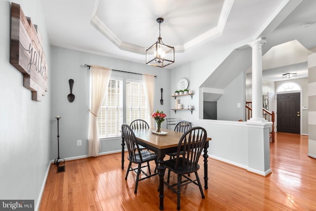 5502 Joshua Tree Cir, Fredericksburg, VA 22407 - dining area with a notable chandelier, visible vents, baseboards, light wood-style floors, and ornamental molding