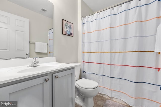 5502 Joshua Tree Cir, Fredericksburg, VA 22407 - full bath with vanity, toilet, curtained shower, and stone finish floors