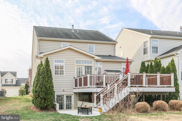 5502 Joshua Tree Cir, Fredericksburg, VA 22407 - rear view of property featuring a yard, a deck, a patio area, and central AC unit