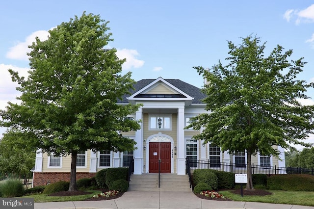 5502 Joshua Tree Cir, Fredericksburg, VA 22407 - greek revival inspired property featuring brick siding and fence