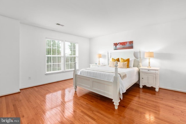 5502 Joshua Tree Cir, Fredericksburg, VA 22407 - bedroom with hardwood / wood-style flooring, baseboards, and visible vents