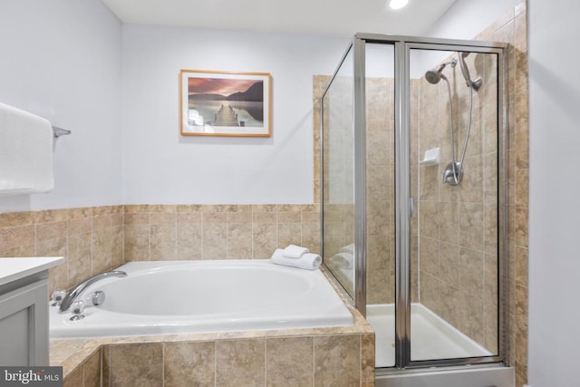 5502 Joshua Tree Cir, Fredericksburg, VA 22407 - bathroom featuring a shower stall, vanity, a bath, and recessed lighting