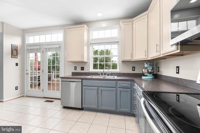 5502 Joshua Tree Cir, Fredericksburg, VA 22407 - kitchen with a sink, a wealth of natural light, dark countertops, and appliances with stainless steel finishes