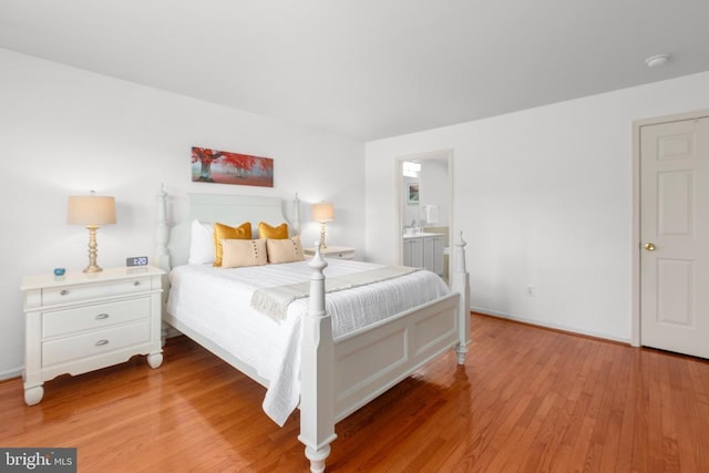 5502 Joshua Tree Cir, Fredericksburg, VA 22407 - bedroom featuring light wood-type flooring and connected bathroom