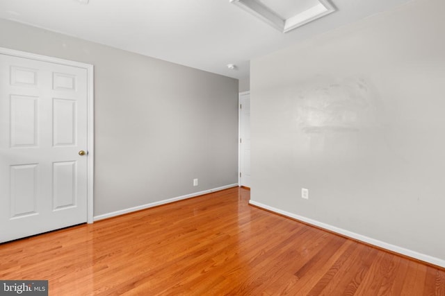 5502 Joshua Tree Cir, Fredericksburg, VA 22407 - unfurnished room with attic access, baseboards, and wood finished floors