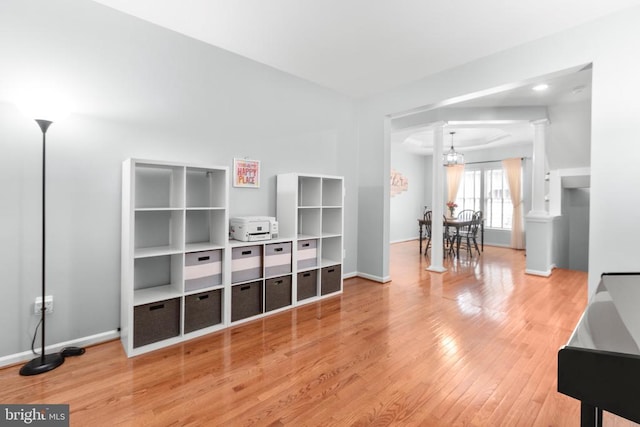 5502 Joshua Tree Cir, Fredericksburg, VA 22407 - interior space featuring an inviting chandelier, wood finished floors, and baseboards