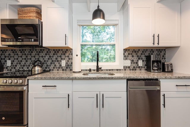 16184 Moonrise Ln, Broadway, VA 22815 - kitchen with stainless steel appliances, decorative backsplash, and white cabinets