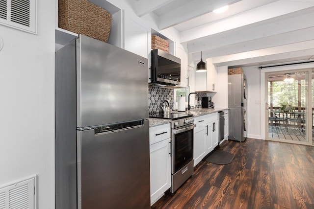16184 Moonrise Ln, Broadway, VA 22815 - kitchen with stainless steel appliances, beamed ceiling, dark wood-style flooring, tasteful backsplash, and light stone counters