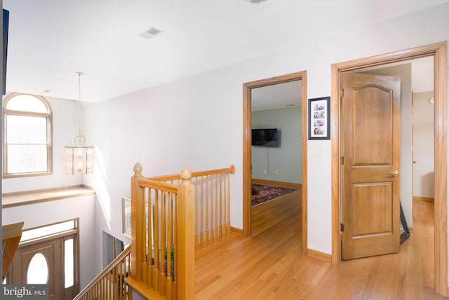 695 Whippoorwill Ln, Shipman, VA 22971 - corridor featuring an upstairs landing, wood finished floors, and baseboards