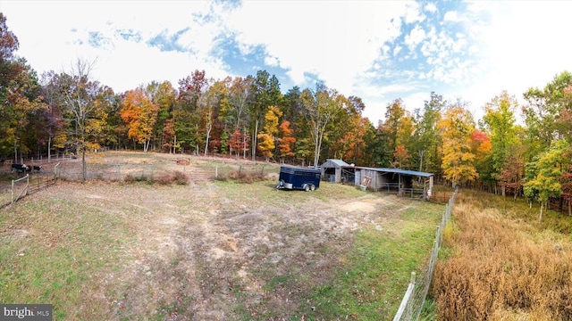 695 Whippoorwill Ln, Shipman, VA 22971 - view of yard featuring fence, a forest view, and an outdoor structure