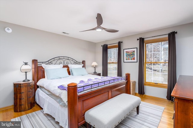 695 Whippoorwill Ln, Shipman, VA 22971 - bedroom with light wood-style floors, a ceiling fan, and baseboards