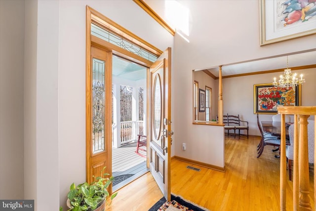 695 Whippoorwill Ln, Shipman, VA 22971 - doorway featuring light wood-style floors, baseboards, and a chandelier