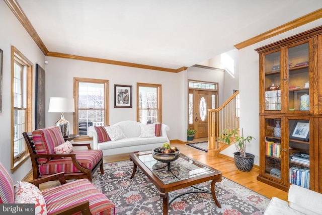 695 Whippoorwill Ln, Shipman, VA 22971 - living room featuring healthy amount of natural light, wood finished floors, crown molding, stairway, and baseboards