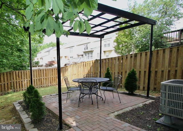 9600 Becker Ct, Fredericksburg, VA 22408 - view of patio / terrace with a fenced backyard, a pergola, outdoor dining space, and central AC