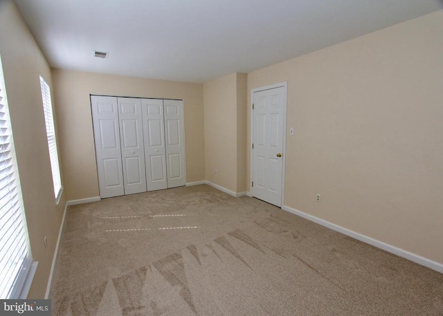 9600 Becker Ct, Fredericksburg, VA 22408 - unfurnished bedroom featuring carpet, visible vents, baseboards, and a closet