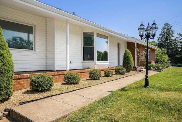 100 Monument Ave, Harrisonburg, VA 22801 - view of home's exterior featuring a yard
