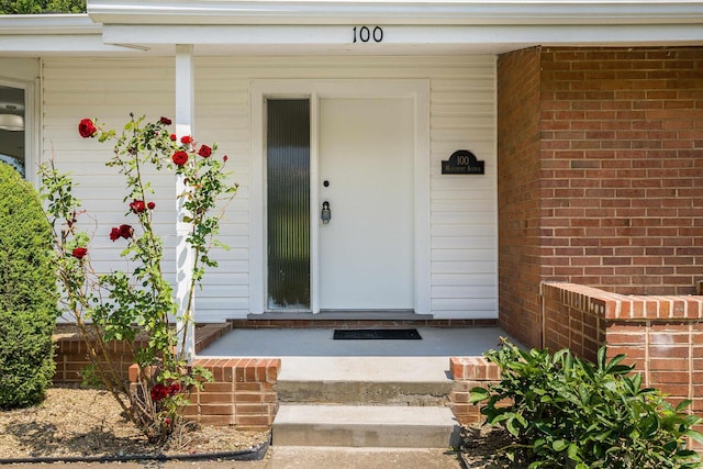 100 Monument Ave, Harrisonburg, VA 22801 - property entrance with a porch and brick siding