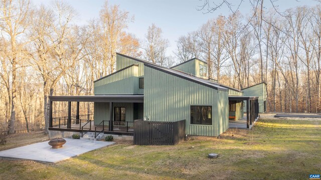 exterior space with a yard and covered porch