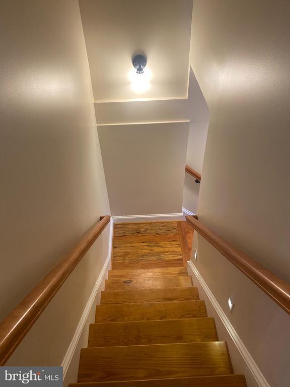  - stairs with wood finished floors