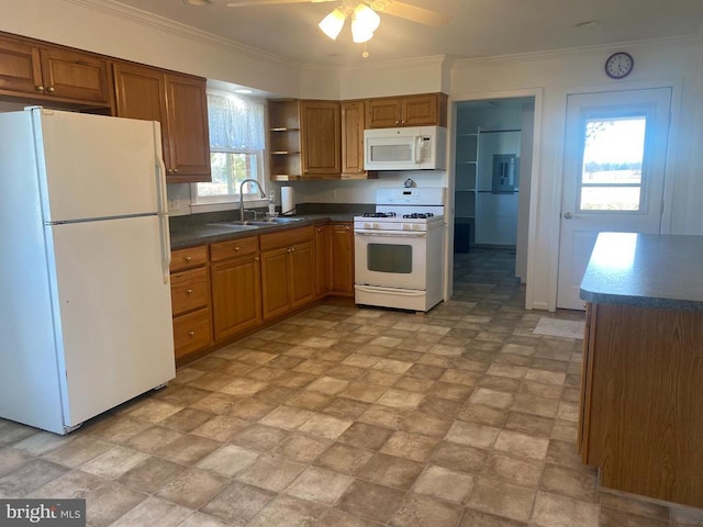  - kitchen with white appliances, a sink, brown cabinetry, open shelves, and ceiling fan