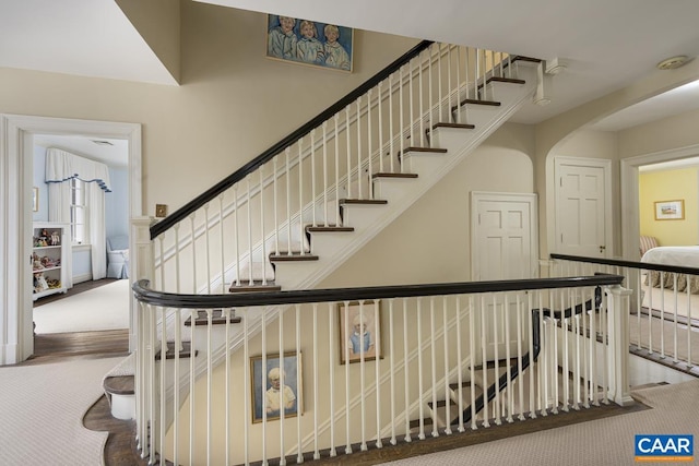 3809 Peakland Pl, Lynchburg, VA 24503 - staircase featuring carpet and arched walkways