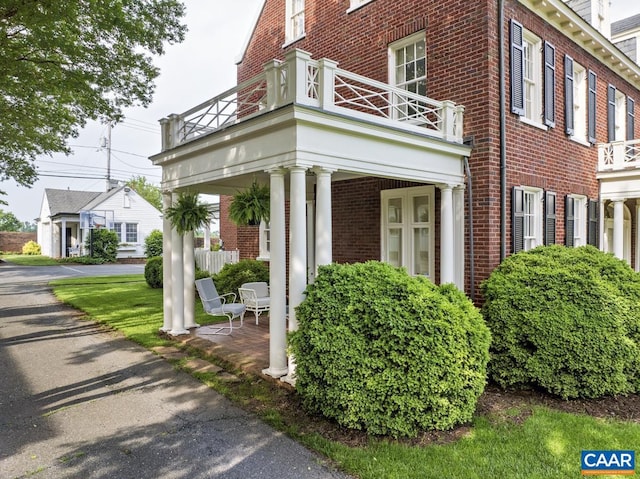 3809 Peakland Pl, Lynchburg, VA 24503 - view of home's exterior with a balcony and brick siding