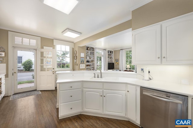 3809 Peakland Pl, Lynchburg, VA 24503 - kitchen featuring dishwasher, crown molding, a peninsula, dark wood finished floors, and white cabinets