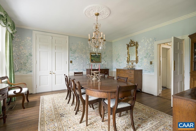 3809 Peakland Pl, Lynchburg, VA 24503 - dining room featuring a chandelier, wallpapered walls, wainscoting, wood finished floors, and crown molding