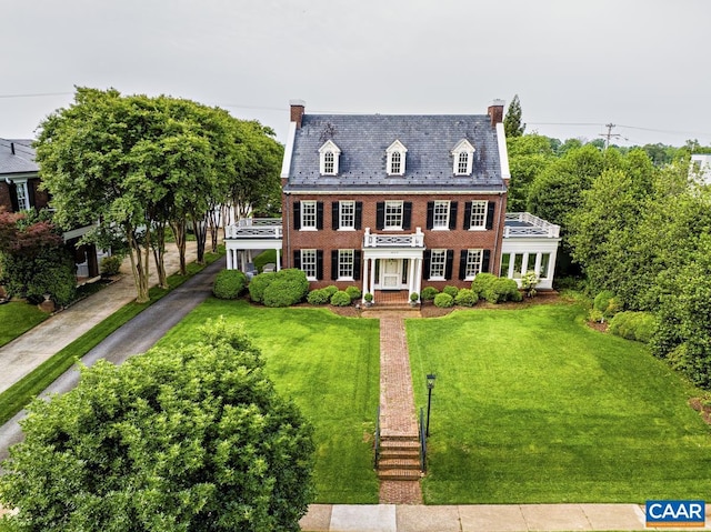 3809 Peakland Pl, Lynchburg, VA 24503 - colonial inspired home with a front yard, a chimney, brick siding, and a high end roof