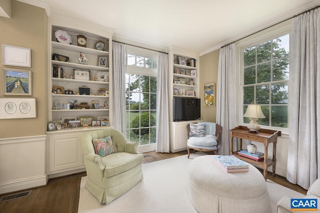 3809 Peakland Pl, Lynchburg, VA 24503 - living area with dark wood-type flooring, ornamental molding, and built in shelves