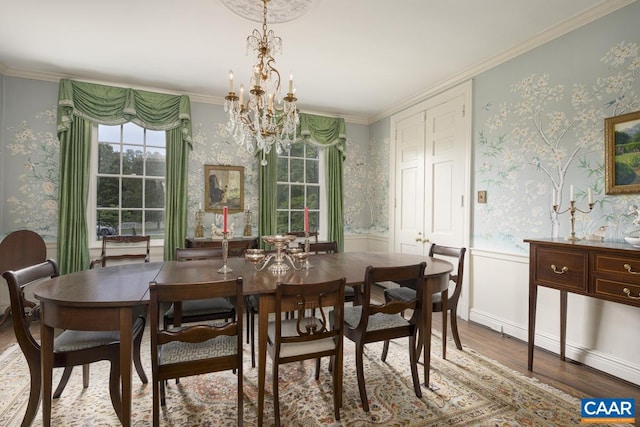 3809 Peakland Pl, Lynchburg, VA 24503 - dining room featuring wood finished floors, a chandelier, wainscoting, ornamental molding, and wallpapered walls