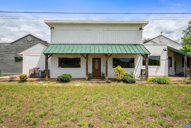 1900 Lowesville Rd, Amherst, VA 24521 - view of front of home with a front yard and metal roof