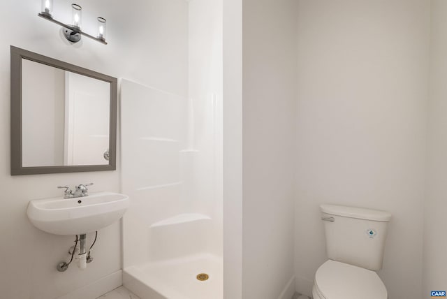 1900 Lowesville Rd, Amherst, VA 24521 - bathroom with toilet, a shower stall, and baseboards